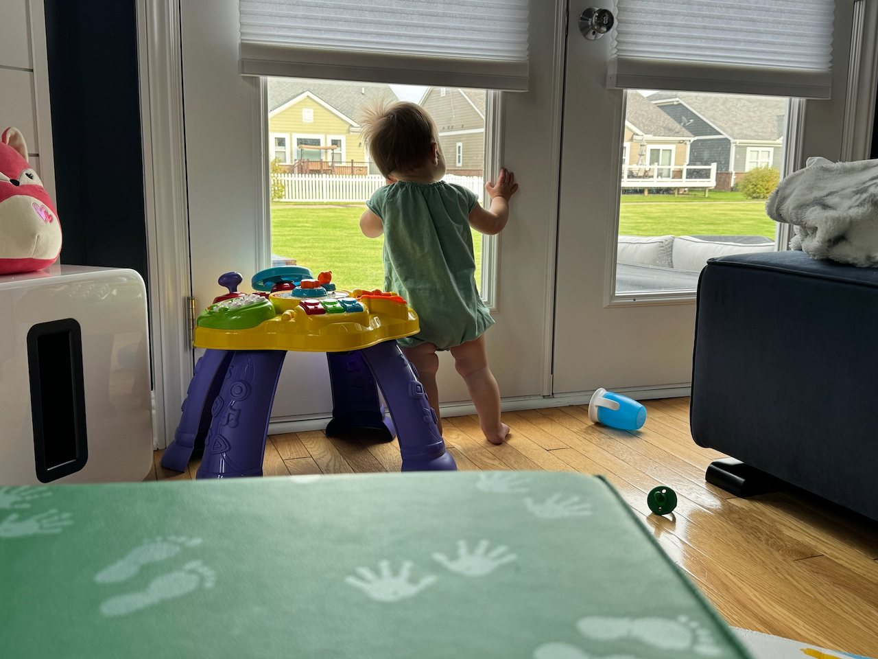 Zoe waiting for Mower Man to come by.