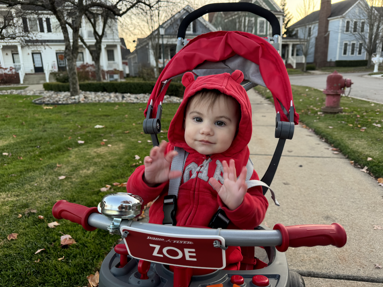 Zoe on her Radio Flyer.
